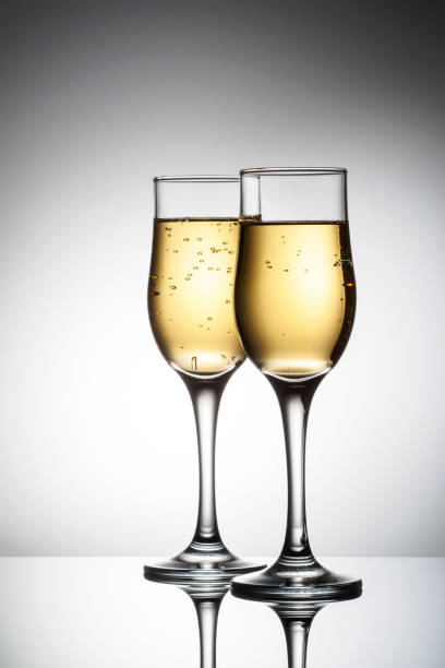istock Two elegant glasses with sparkling champagne 1074596220