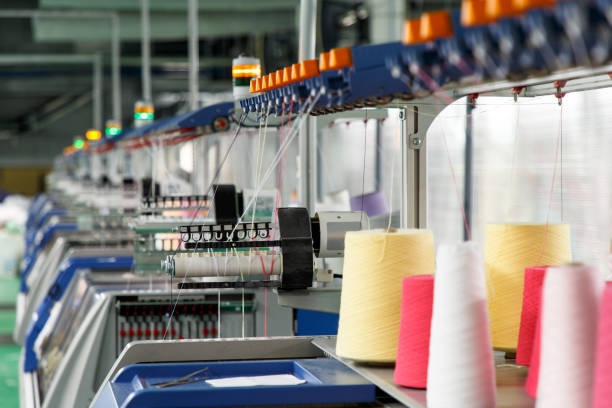 istock Textile industry with knitting machines 1074621166