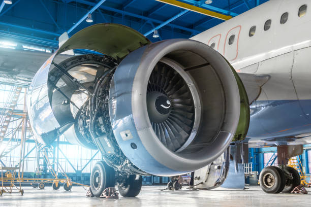 istock Aircraft engine jet on the wing during maintenance in the hangar. 1074625122