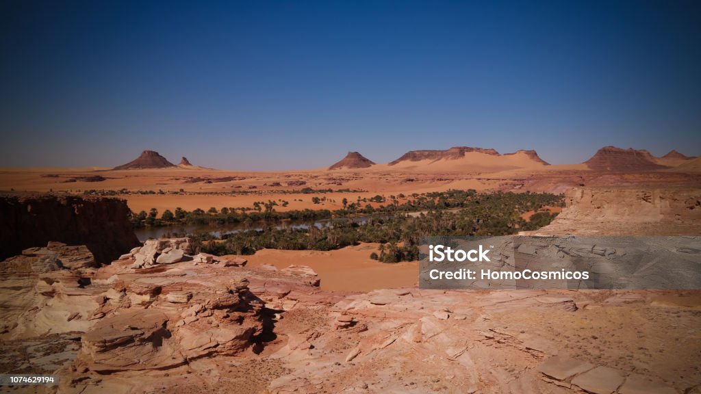 Panoramic view to Teguedei lake at the Ennedi, Chad aerial Panoramic view to Teguedei lake , Ennedi, Chad Chad - Central Africa Stock Photo