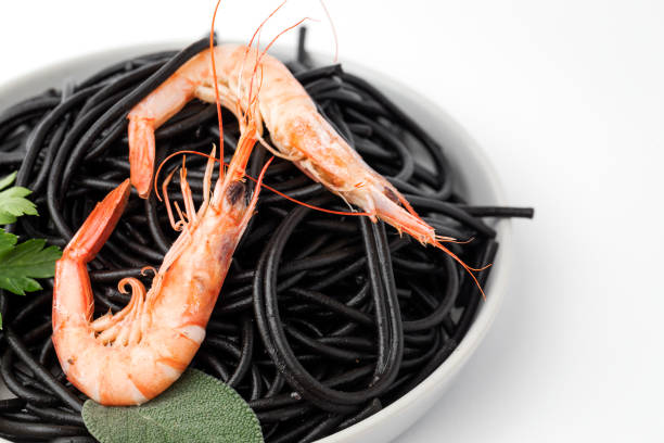 istock Black spaghetti with prawns. Homemade. 1074630546