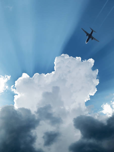 istock Aircraft Taking Off and Beatiful Clouds Above 1074632570
