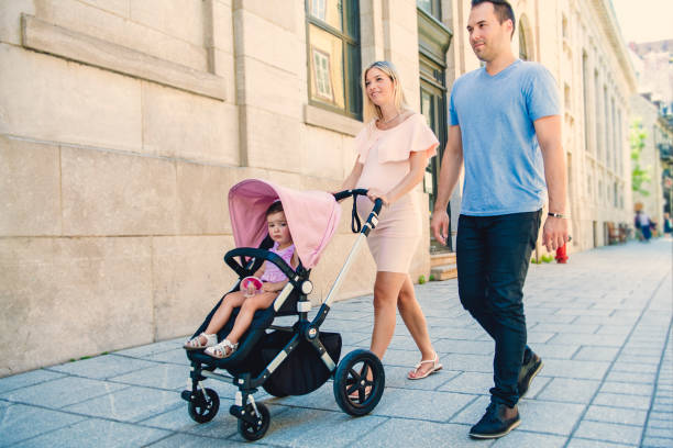 istock Family taking a walk down the street 1074636296