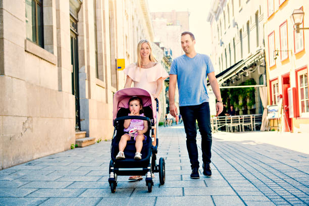 istock Family taking a walk down the street 1074636354