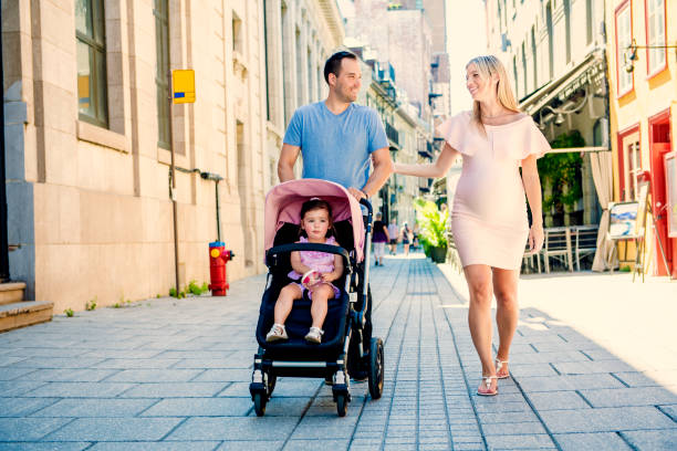 istock Family taking a walk down the street 1074636358