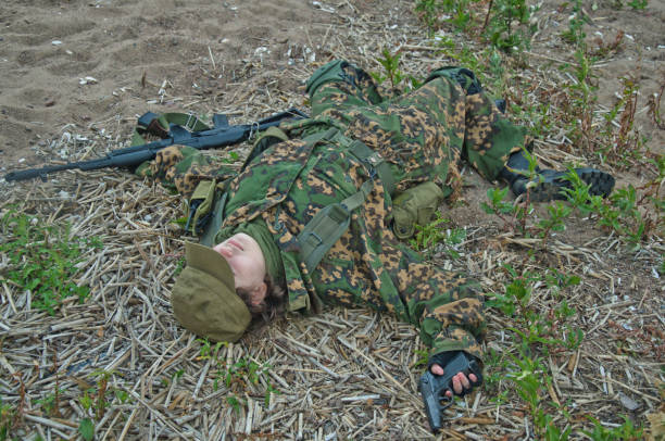 istock killed young girl in uniform lying on the ground 1074636538