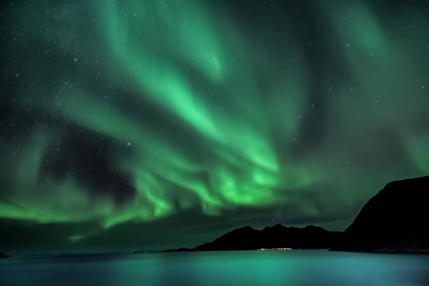 istock Aurora Borealis - northern lights - View from Grotfjord - Kwaloya -  Norway 1074640016