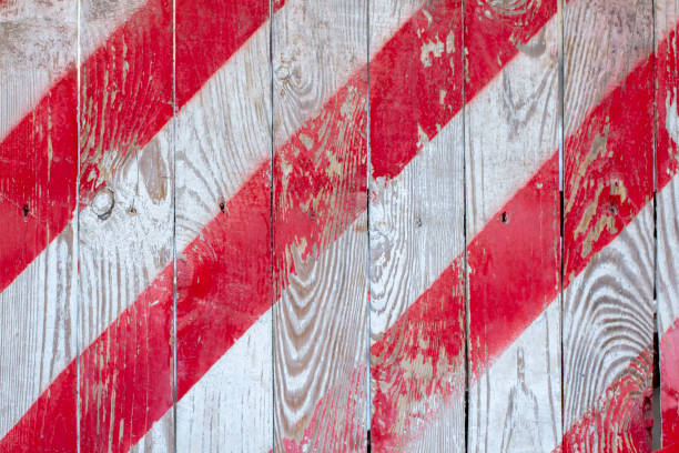 istock red and white stripes on wood background 1074648260