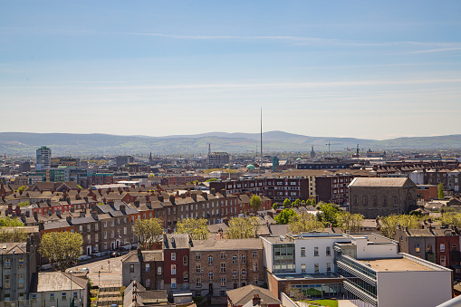 Beautiful aerial view on Dublin with spire in the middle and hills on the background