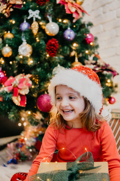 istock Joy near the Christmas Tree 1074652148