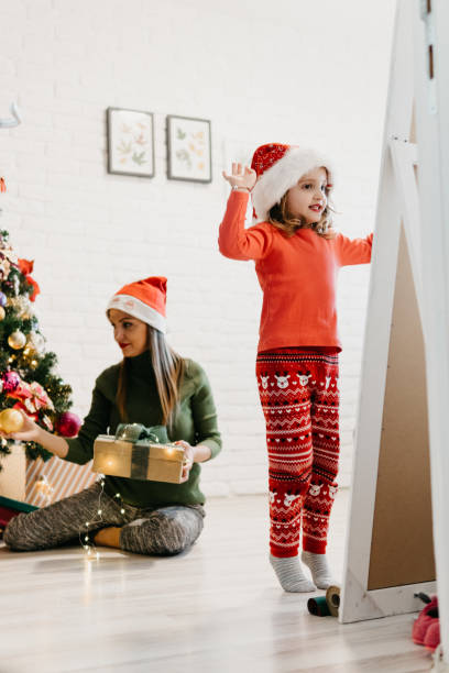 istock Joy near the Christmas Tree 1074653580