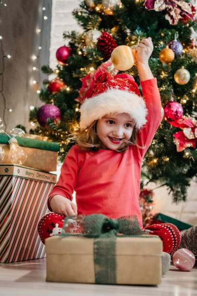 istock Joy near the Christmas Tree 1074653852