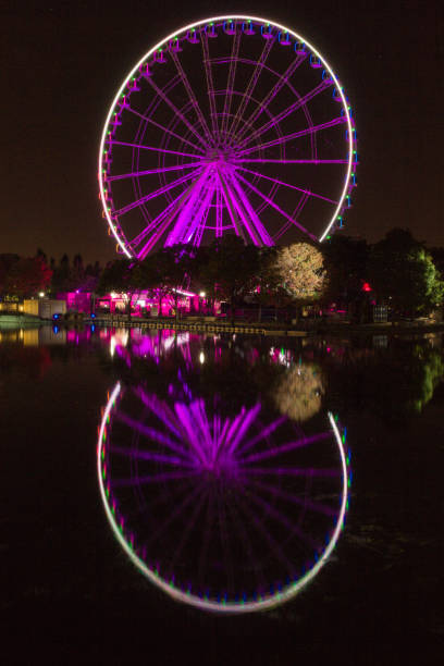 istock Big Wheel of Montreal at night (Canada) 1074658408