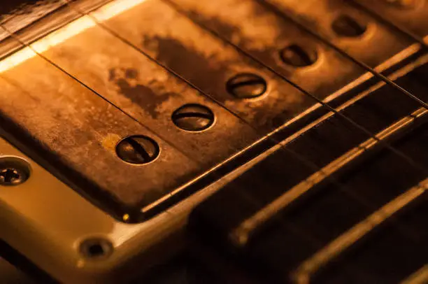 electric guitar close-up strings, pickup