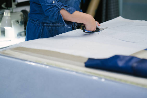 istock Fashion designer working in her studio. 1074666122