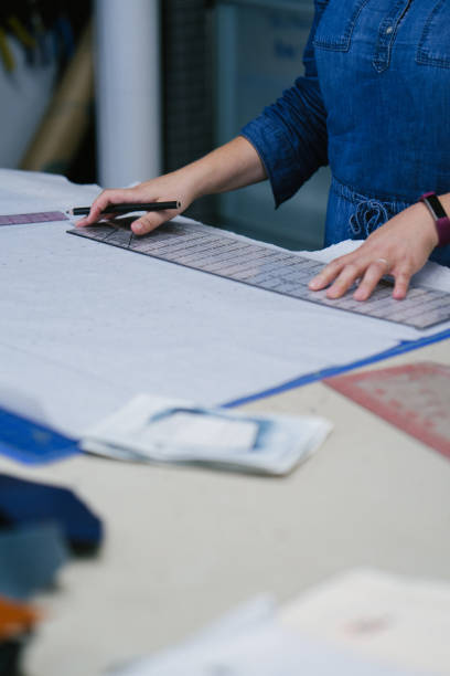 istock Fashion designer working in her studio. 1074666202