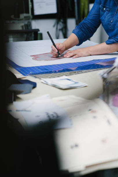 istock Fashion designer working in her studio. 1074666322
