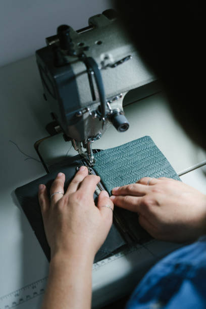 istock Fashion designer working in her studio. 1074666512