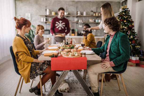 istock Having Christmas Dinner With Friends 1074669686