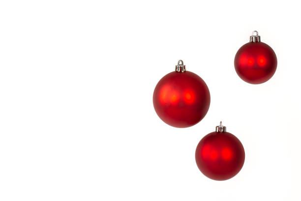 Red Christmas balls on white background