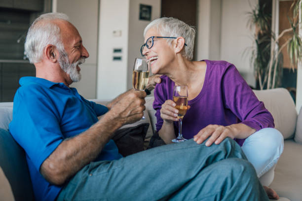 istock Husband and wife drinking wine 1074674996
