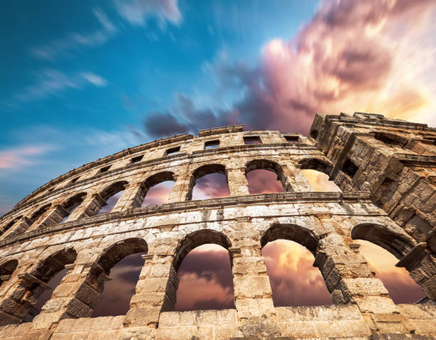 istock Famous Pula Amphitheatre in Croatia with dramatic sky 1074689164