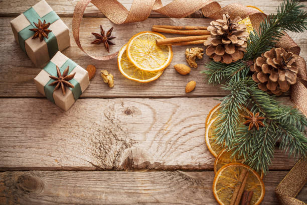 istock Christmas decorations on old wooden background 1074689362