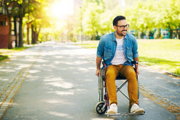 istock Student in a wheelchair 1074702186