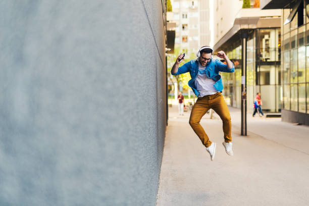 istock Man listening music 1074704464