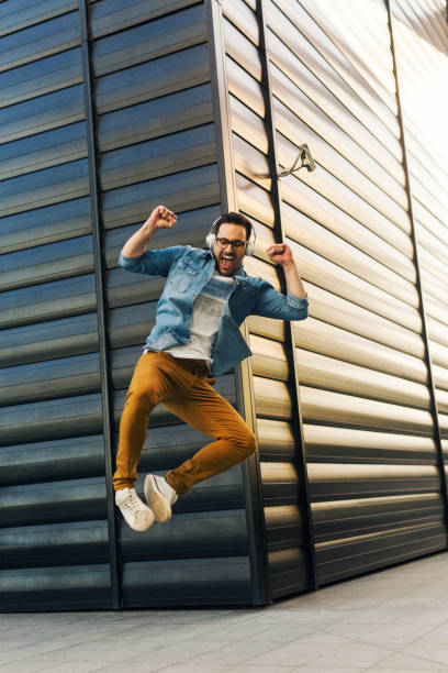 istock Man listening music 1074704492