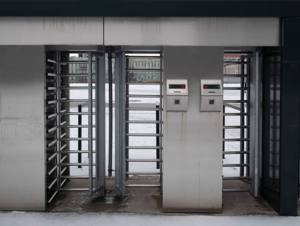 istock close up of chrome turnstiles with electronic tickets check 1074709850
