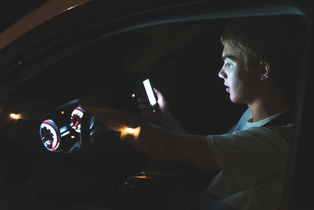 Distracted teenage driver.