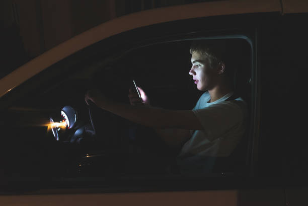 istock Distracted teenage driver. 1074711530