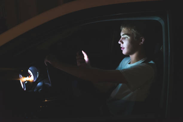 istock Distracted teenage driver. 1074714802