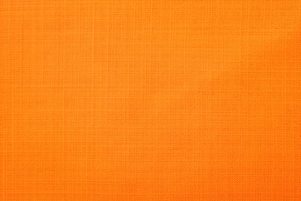 orange fabric background - burlap textured textured effect textile imagens e fotografias de stock