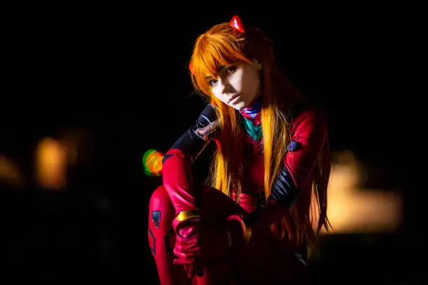 Young attractive girl dressed up at night wearing a costume