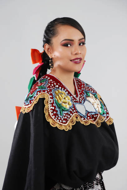 istock Mexican woman in typical dress 1074727910