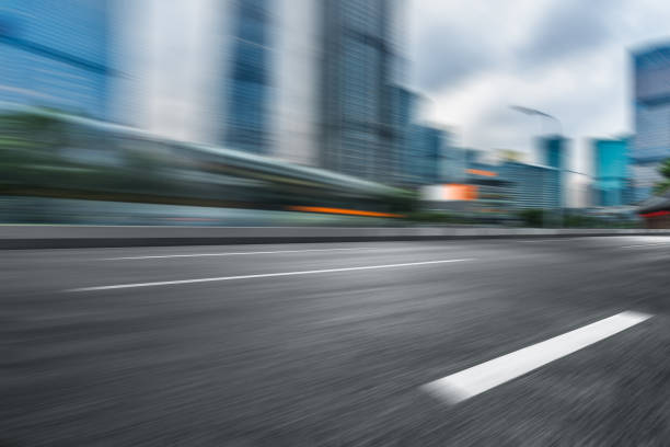 istock City empty road with modern buildings background 1074731058