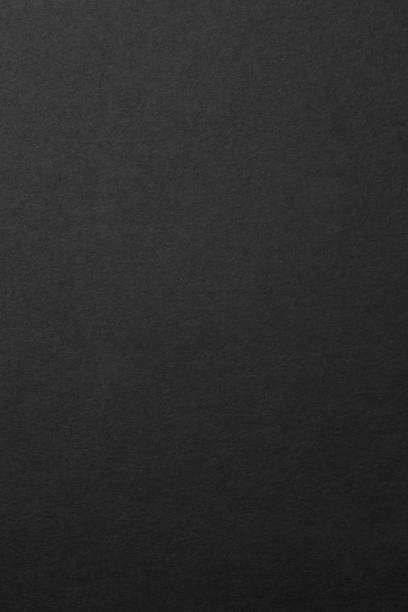 istock Sheet of black paper texture 1074735048