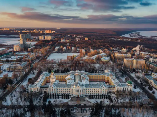 Aerial view of Voronezh in winter evening from height of drone flight.  Voronezh State Agricultural University, Voronezh, Russia