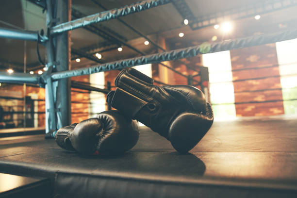 glove in gym glove in gym boxing stock pictures, royalty-free photos & images