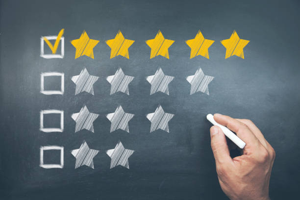 istock man rating star on board 1074737696