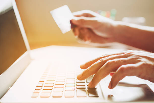 istock People using credit card for shopping online. 1074737700
