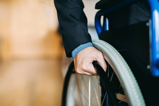 istock Disable businessman on the wheelchair return to work again. 1074737778