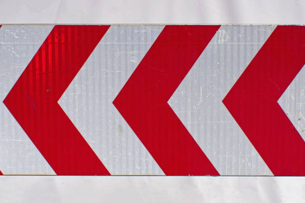 Chevron sign Chevron warning traffic sign red arrows road chevron warning signs stock pictures, royalty-free photos & images