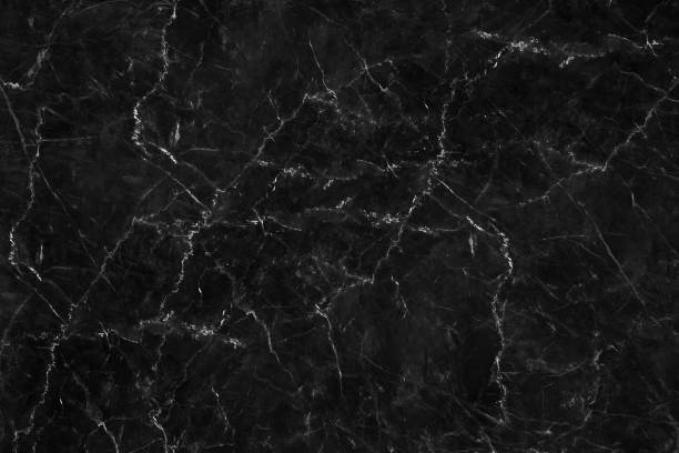 istock The luxury of black marble texture and background for design pattern art work. Marble with high resolution 1074744608