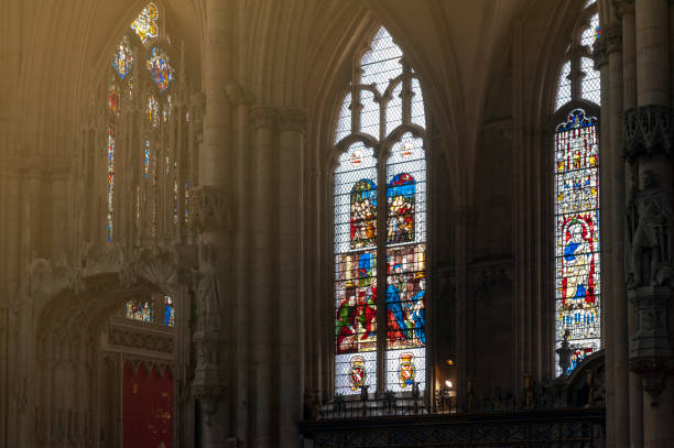 french glass, medieval stained glass from 16th century inside cathedral of york minster in city of york, england, uk - york england england minster middle ages imagens e fotografias de stock