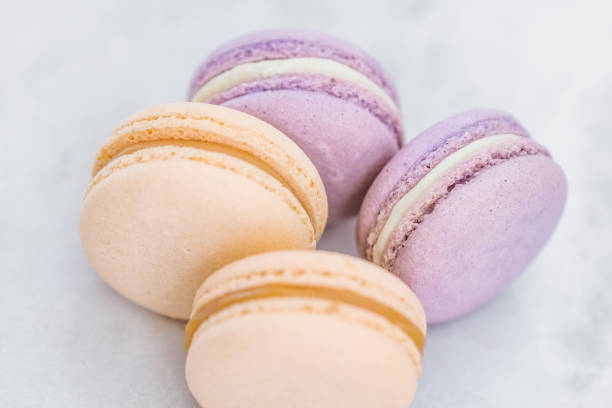 istock Pastel French macarons on white table 1074761662