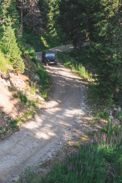 istock Offroad car on a mountain road 1074765554