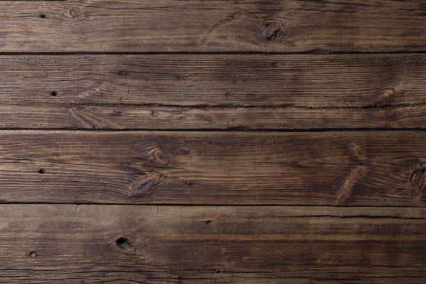 istock old dark wooden background 1074767334